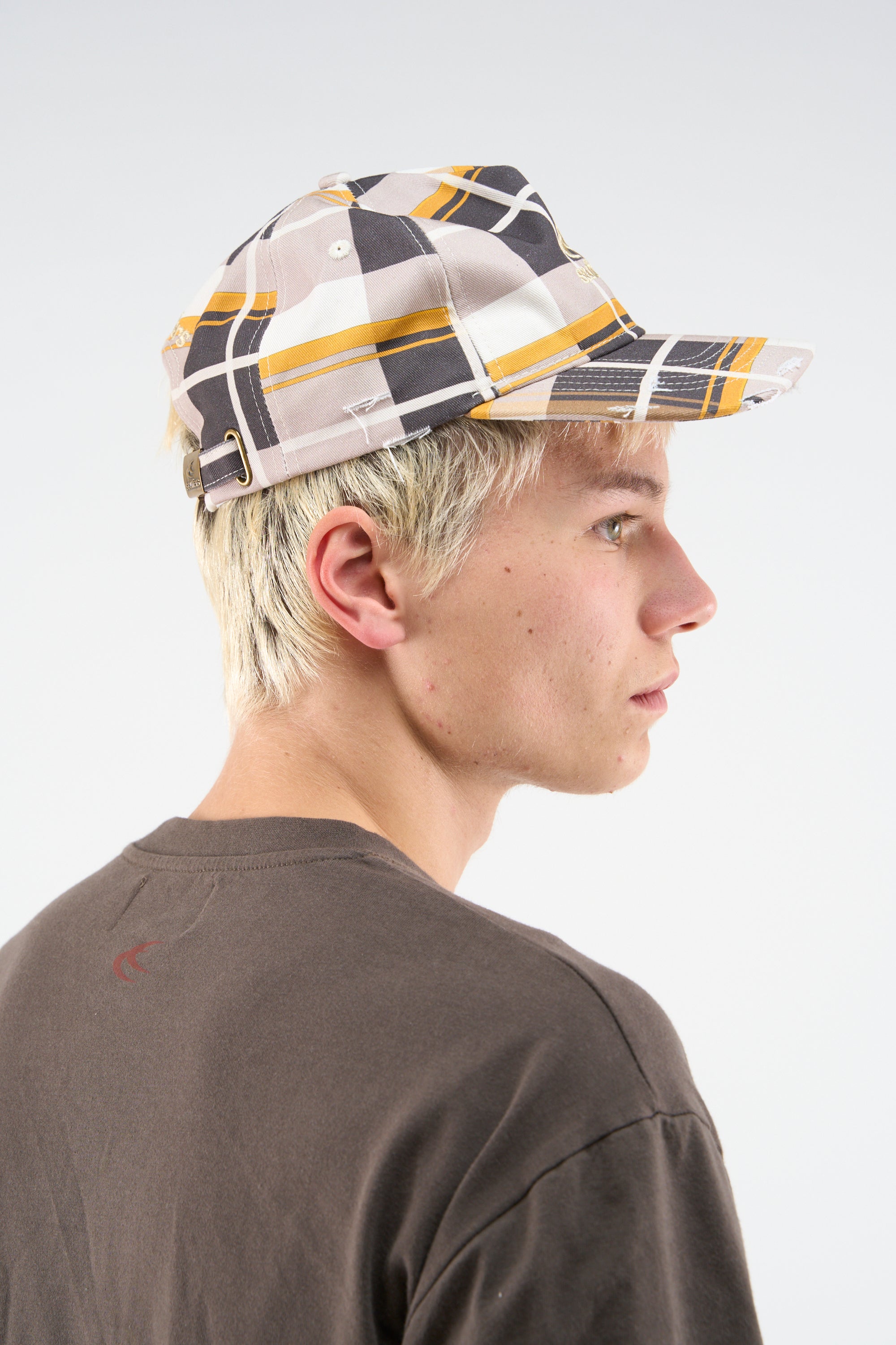 Karierte braune Kappe